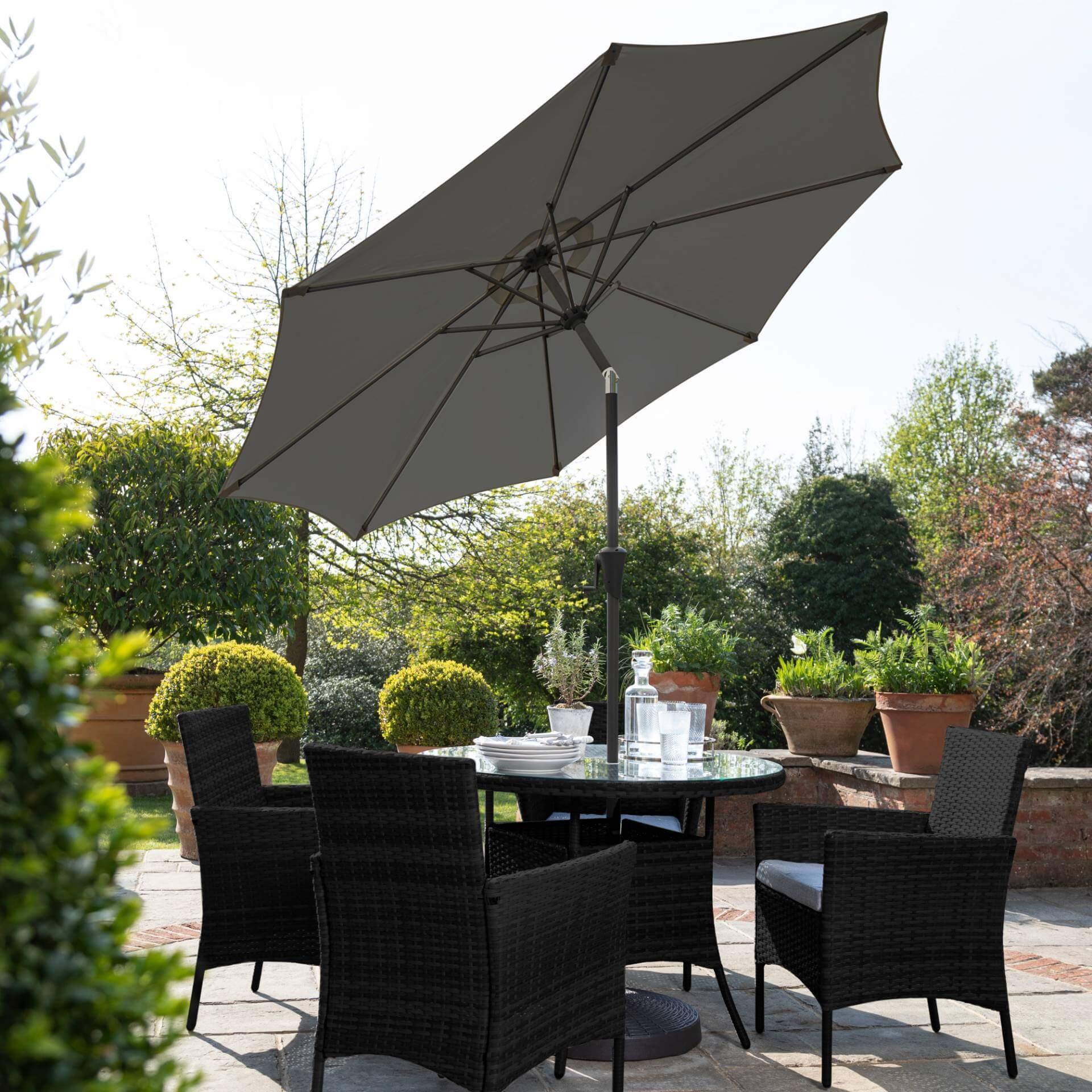 Kemble 4 Seater Rattan Round Dining Set with Grey LED Premium Parasol & Parasol Rain Cover - Black Weave - Image 10